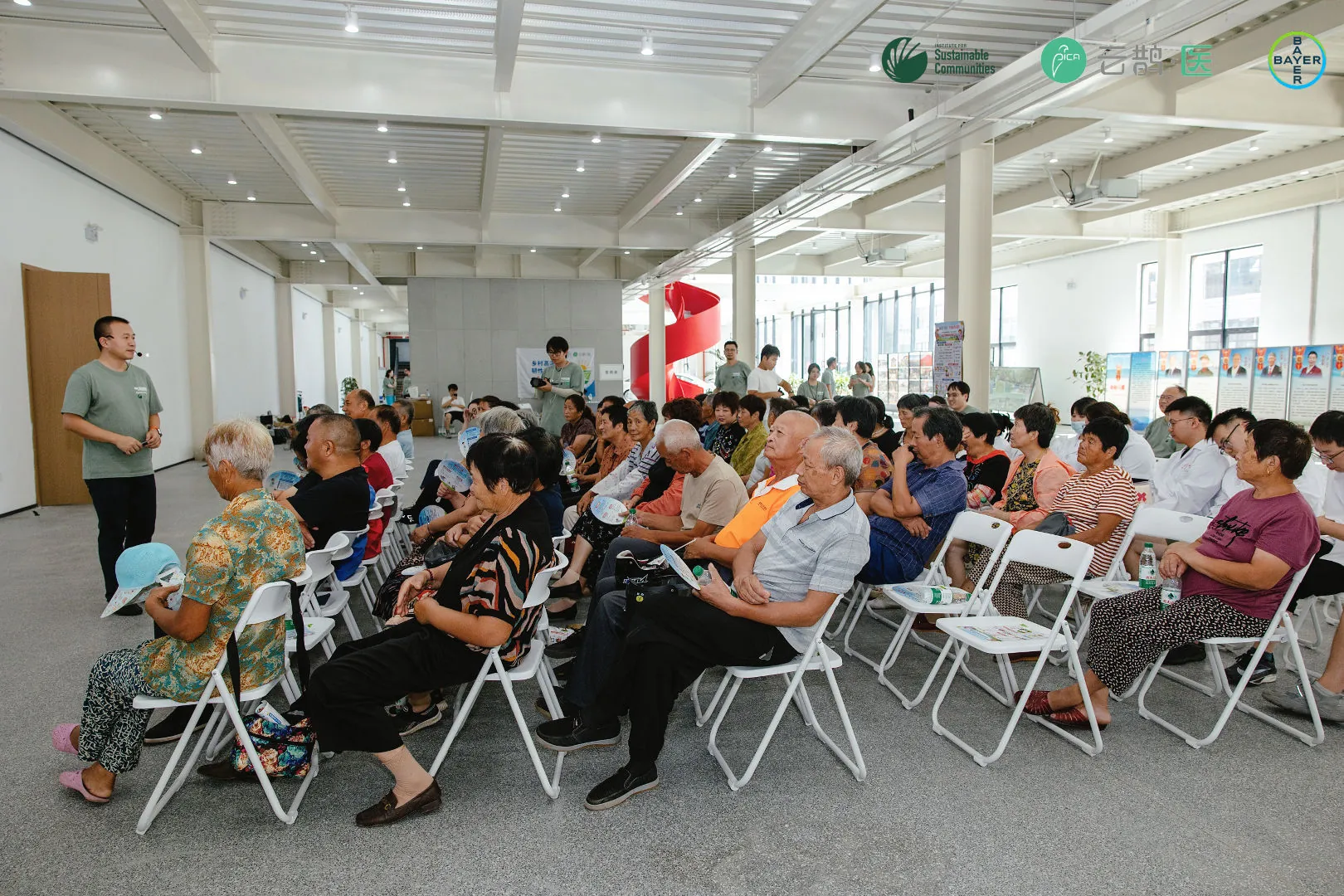 The community training session in progress from the side of the room