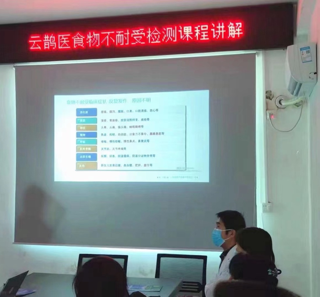 Grassroots physicians attending an in-person training session on clinical testing